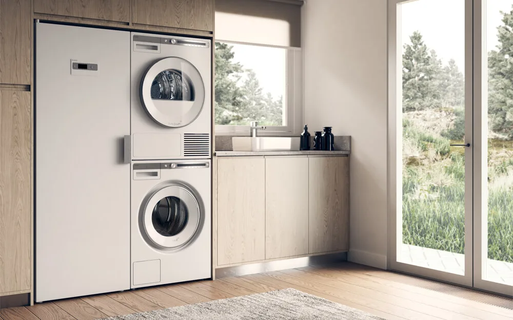 Efficient Laundry Room with Modern Washing Machines and Whitegoods Modern laundry room featuring washing machines, dryers, and white cabinetry