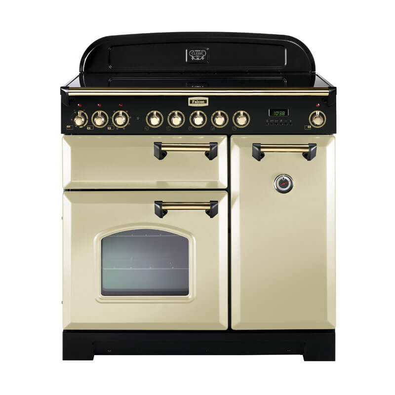 Falcon Classic Deluxe 90cm Cream & Brass Induction Range Cooker | CDL90EICR-BR – A stylish freestanding kitchen appliance with cream and brass accents, featuring multiple ovens and induction cooktops for modern cooking.