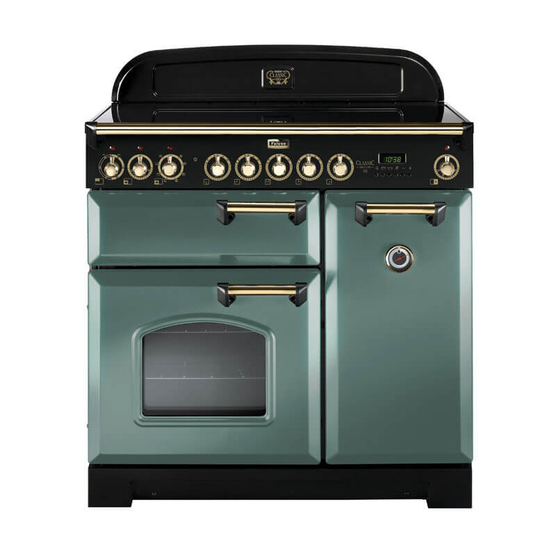 Falcon Classic Deluxe CDL90EIMG-BR 90cm Mineral Green & Brass Induction Range Cooker – A freestanding kitchen appliance with a stylish blend of green and brass, offering versatile cooking with its induction cooktop and dual ovens.