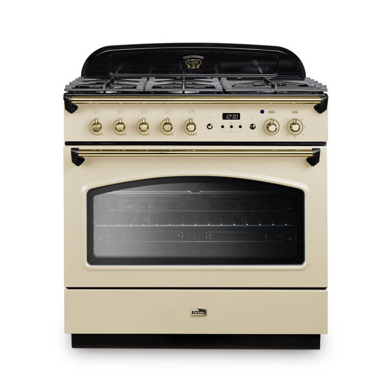 Falcon Classic Fx 90cm dual fuel range cooker in cream and brass, offering luxurious design and high-performance features